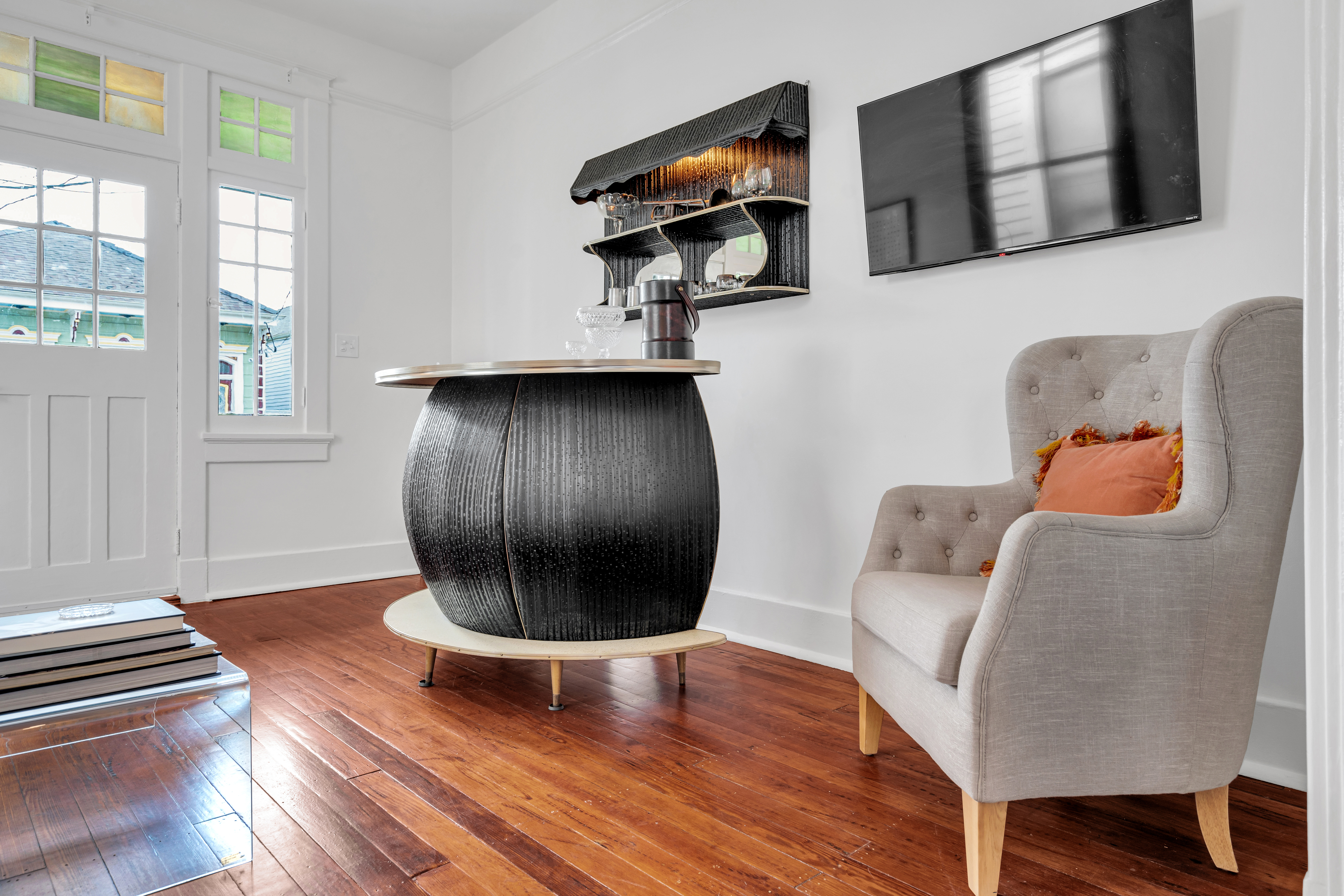 Bar island with modern design and warm wood floors