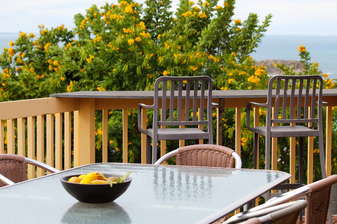 Enjoy relaxing water views directly from the upstairs balcony, setting the tone for a tranquil getaway.