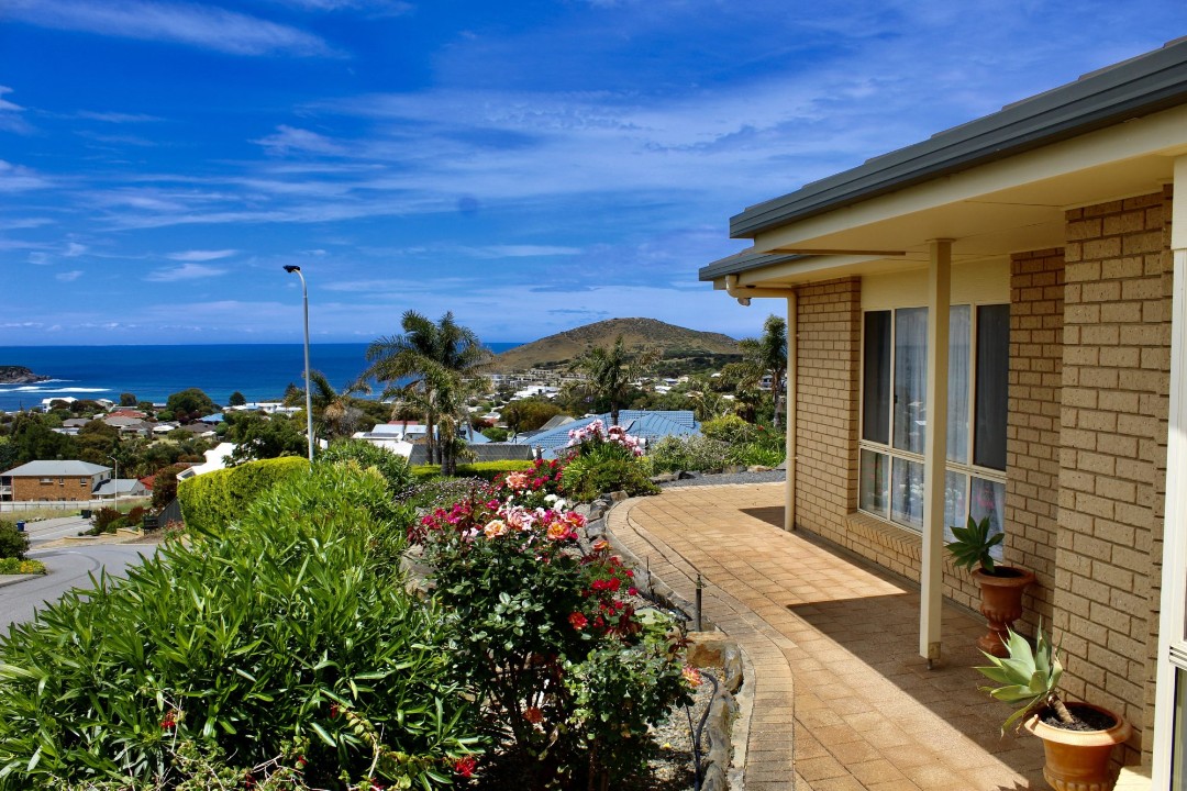 Uninterrupted vistas from Granite Island to The Bluff, best enjoyed through floor-to-ceiling windows and outdoor dining areas