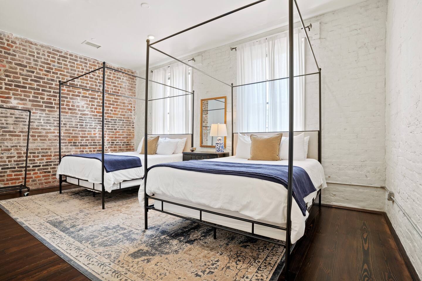 Huge bedroom with two queen beds perfect for groups and ensuite bathroom