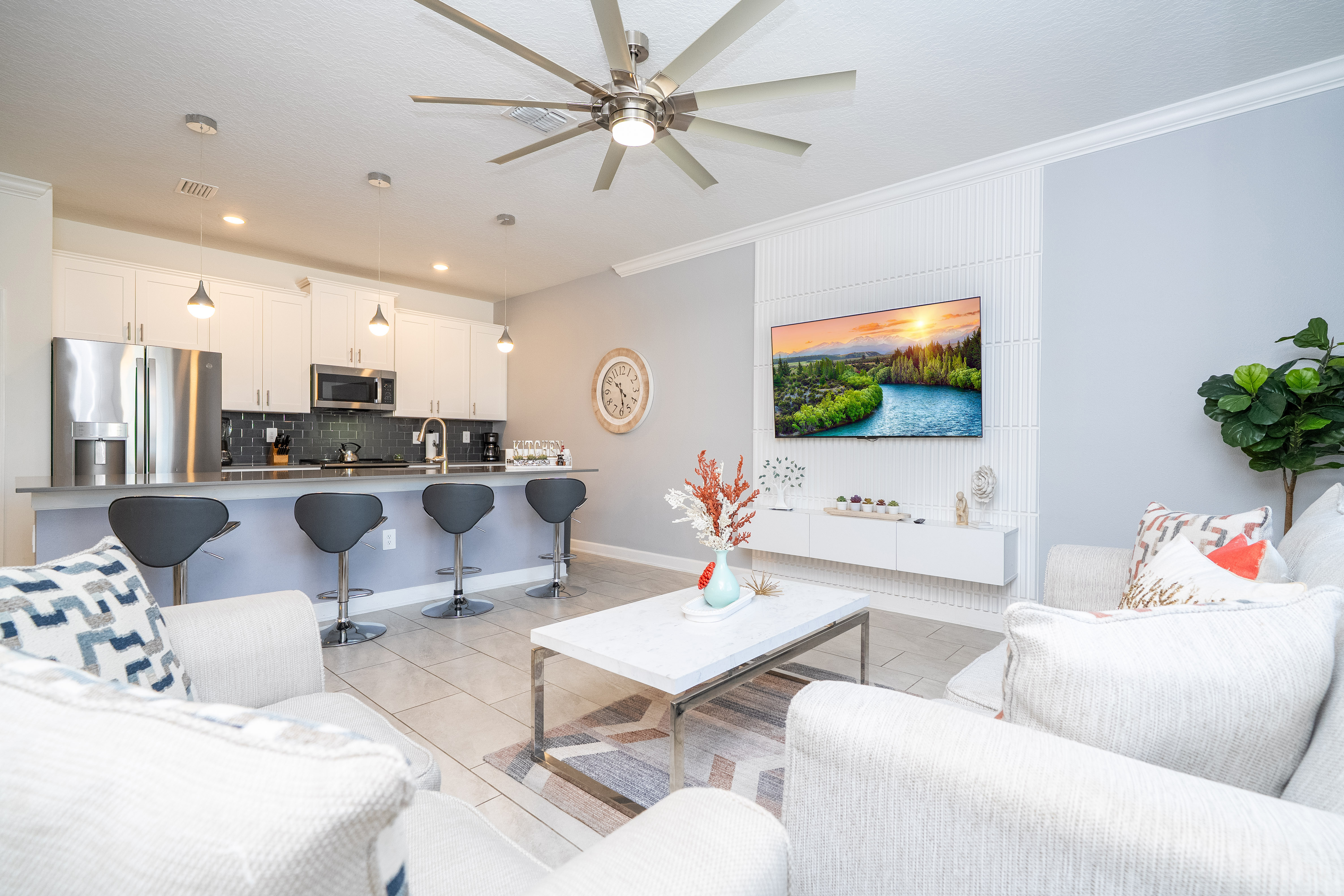 Open living space that seamlessly connects the beautiful kitchen and dining area, offering a perfect blend of comfort and style. You could enjoy a Smart TV and feel just like home!