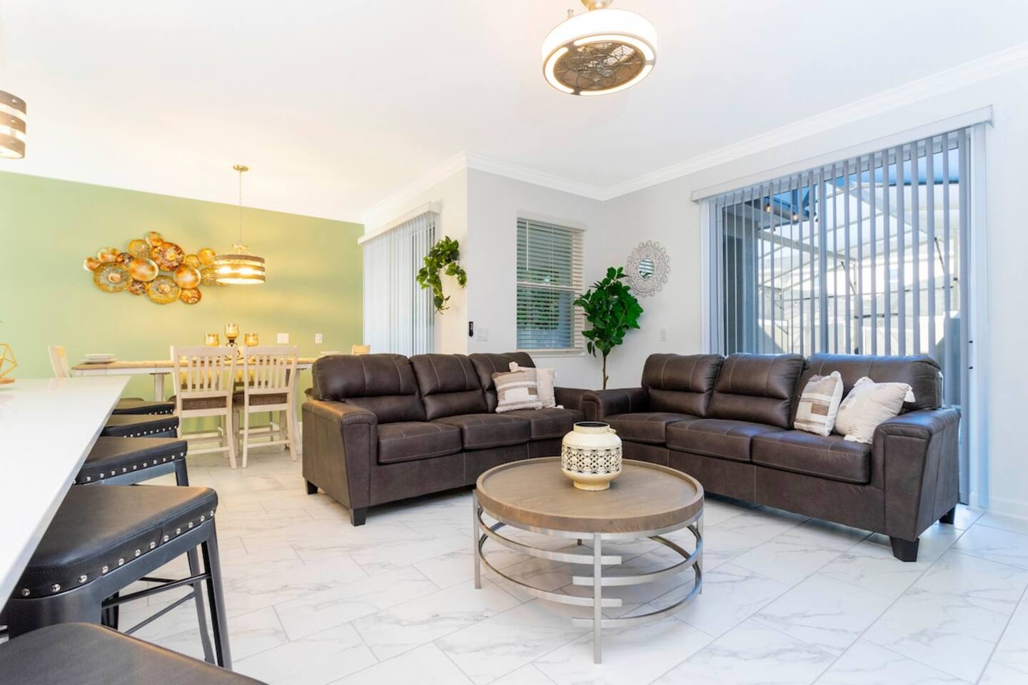 Open living space that seamlessly connects the beautiful kitchen and dining area, offering a perfect blend of comfort and style.