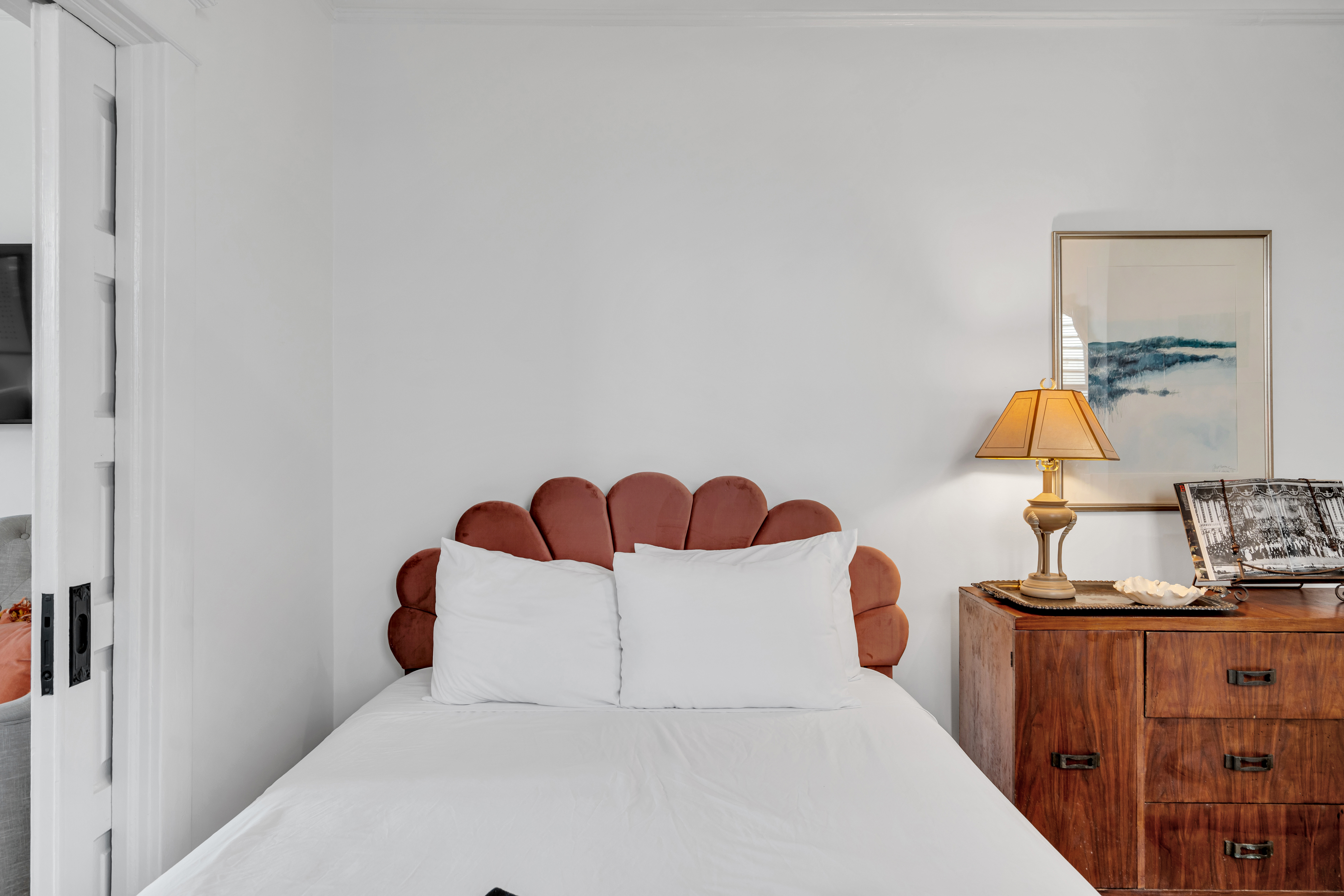 Comfortable bed with statement headboard