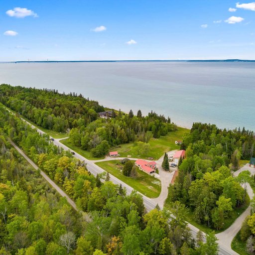 Scenic surroundings and a peaceful lakefront setting shared among nearby cottages.
