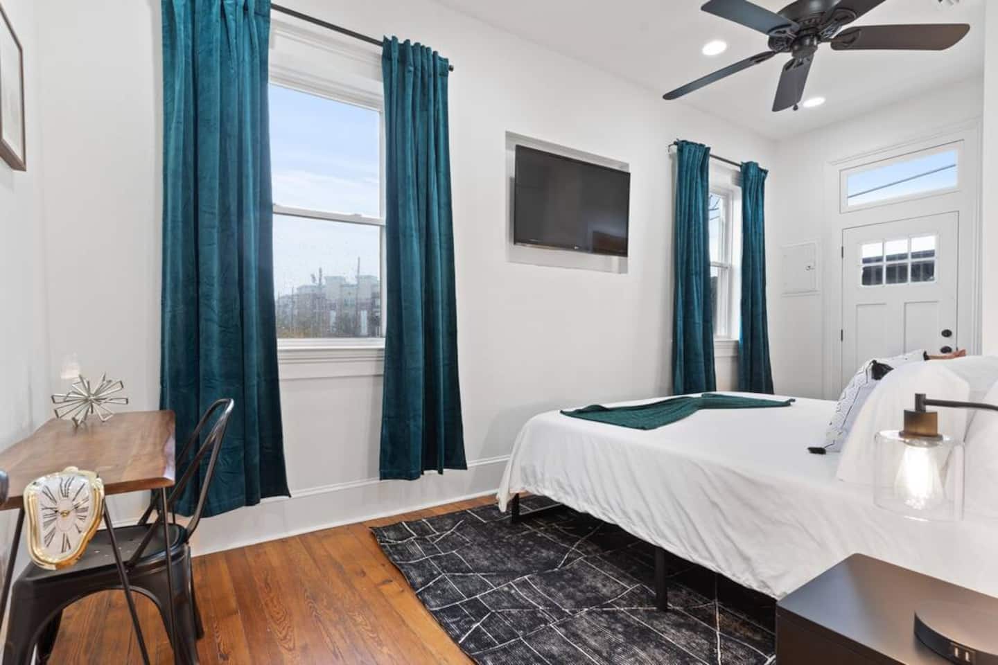 Bedroom 2 with door to balcony (closet not pictured)
