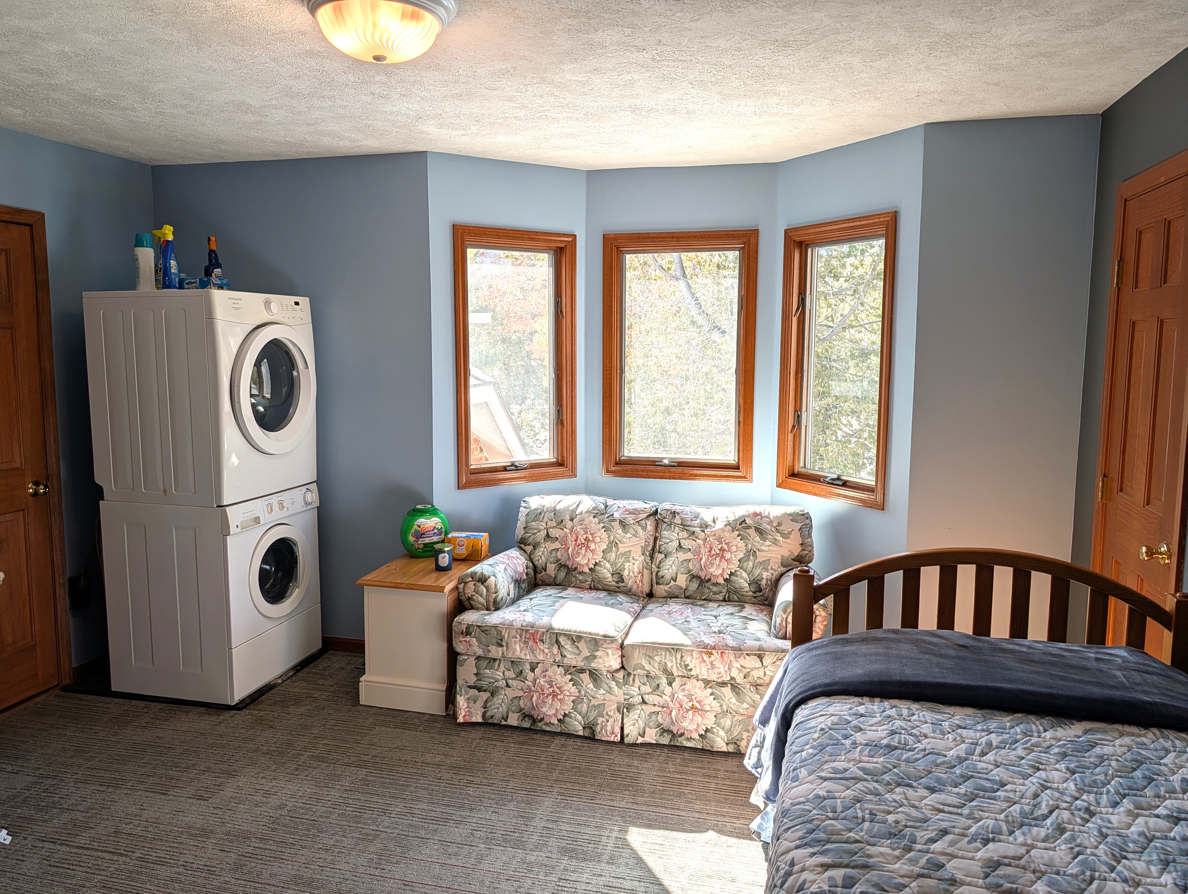 BEDROOM #5 (SECOND FLOOR):  Mixed-use bedroom on the second floor with a trundle bed, loveseat, and a washer and dryer.