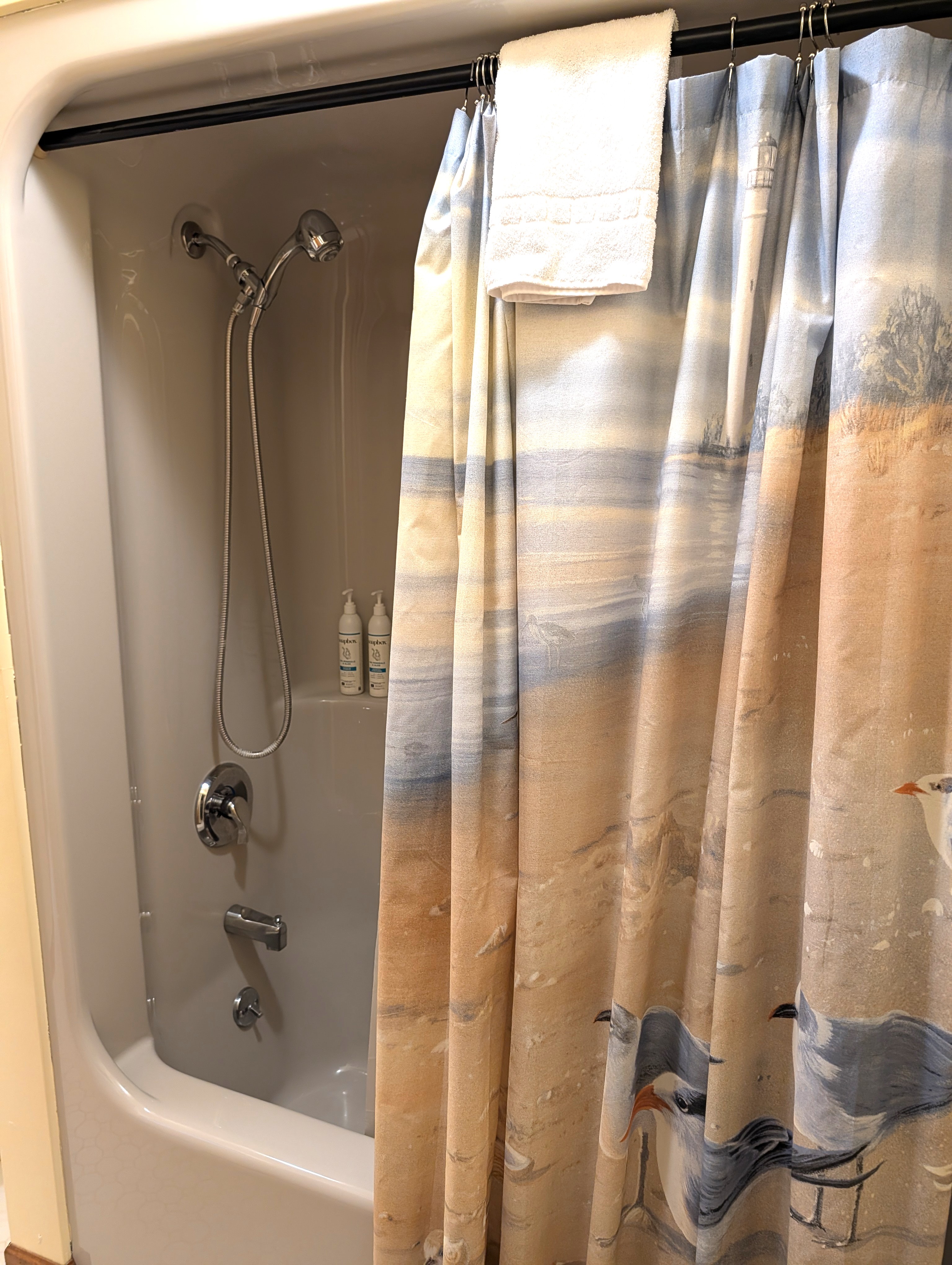 BATHROOM #3 (SECOND FLOOR):  This is a "jack and jill full bathroom" with private entrances from both Bedroom #3 and Bedroom #4.  Includes 2 separate sinks each with a mirror and vanity along with a toilet and a combination tub and shower.