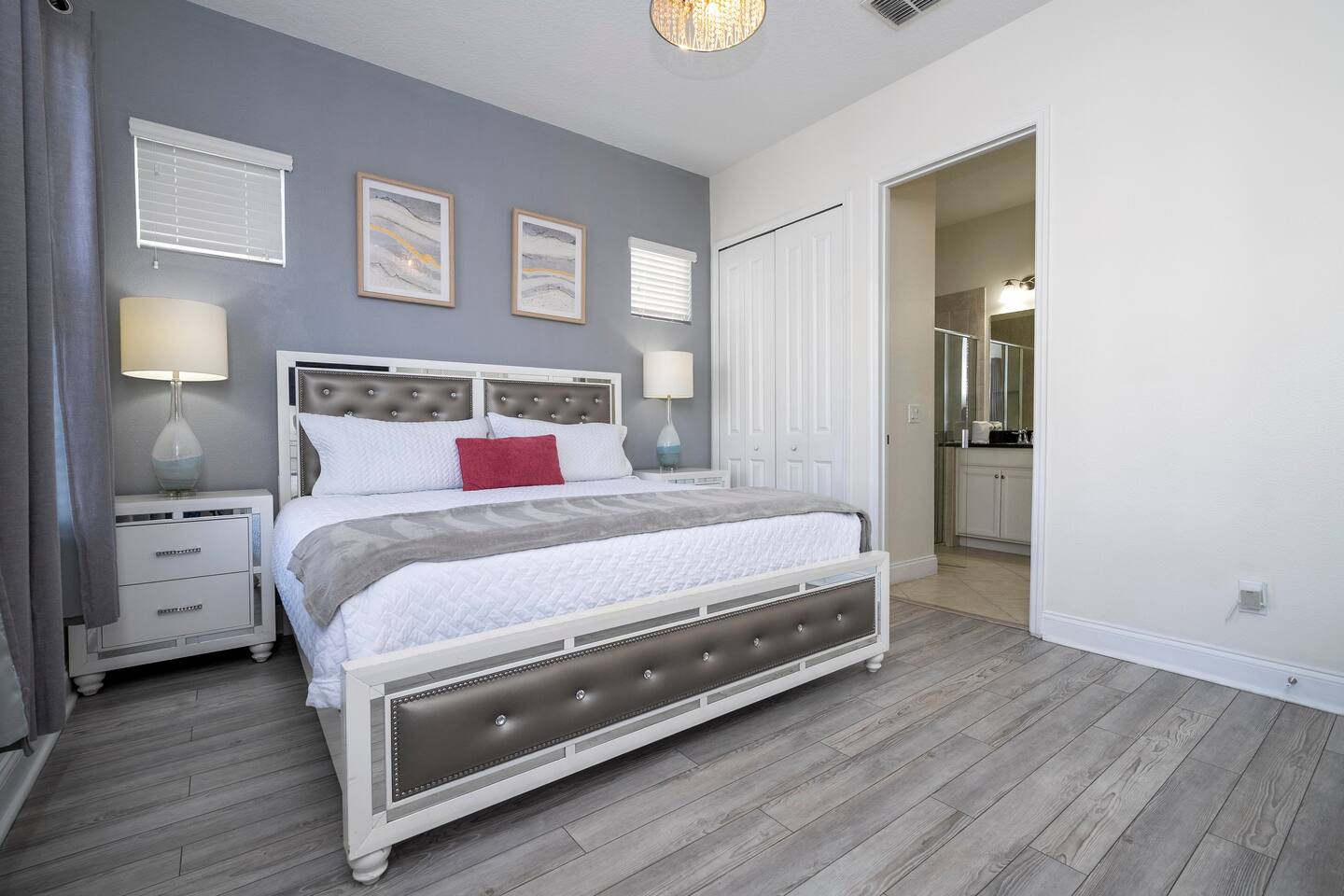 Ground-floor king bedroom with private bathroom and smart TV, ideal for guests seeking easy access and comfort