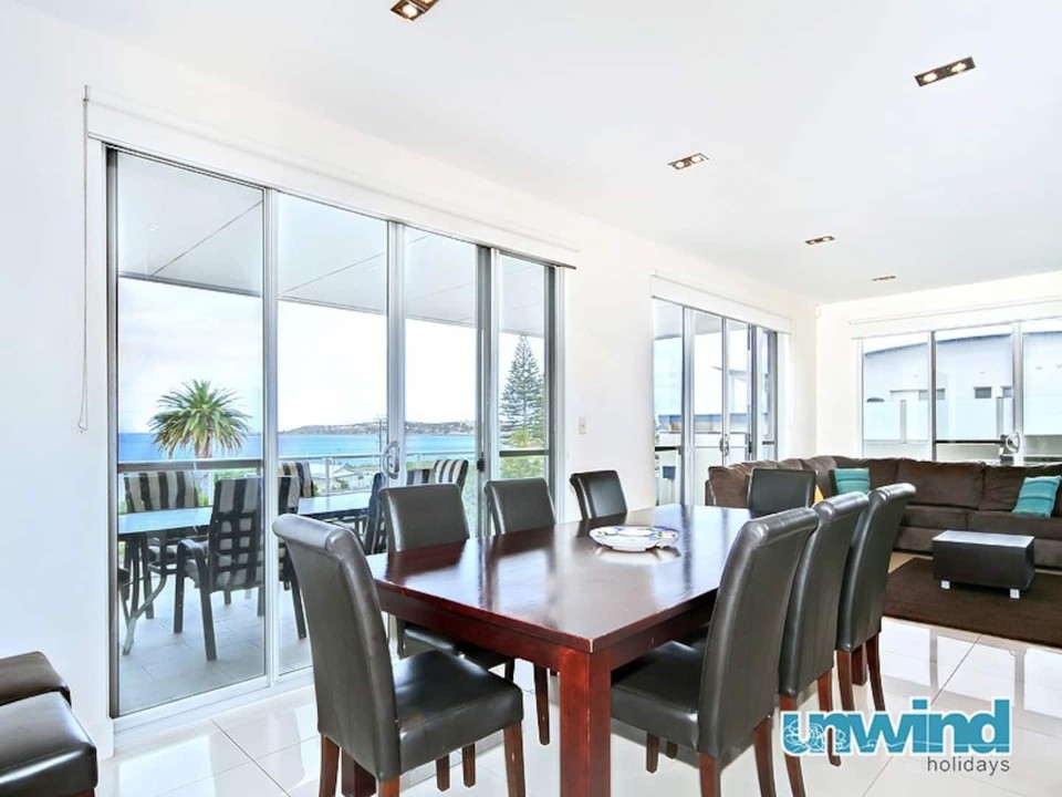 Top-floor apartment boasting panoramic outlooks over Encounter Bay and Granite Island from the private balcony.