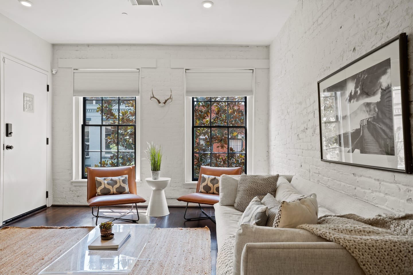View of the living room space and our modern decor