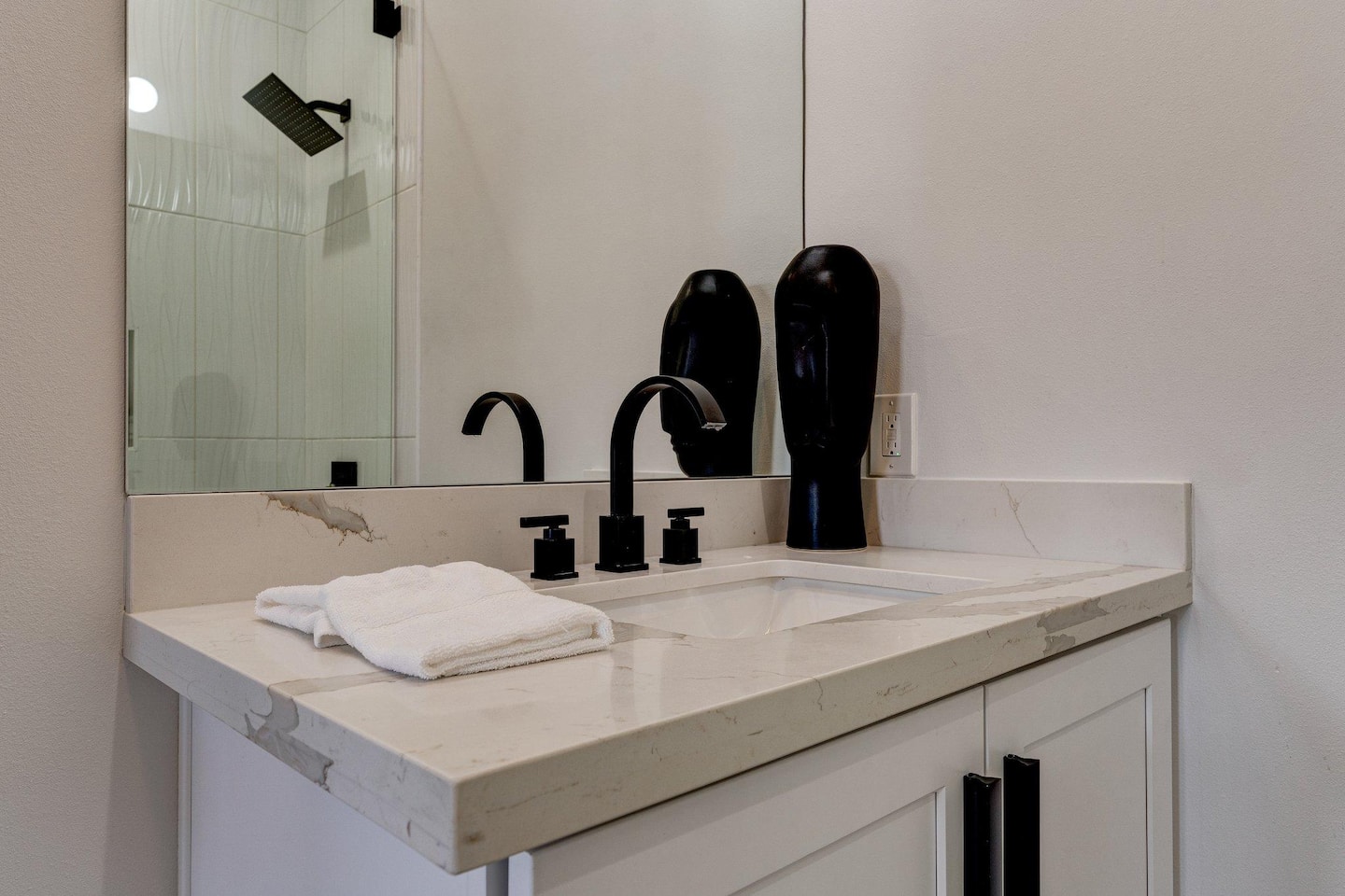 Custom cabinets and carefully curated quartz counters. (Bathroom 1.5/3.5)