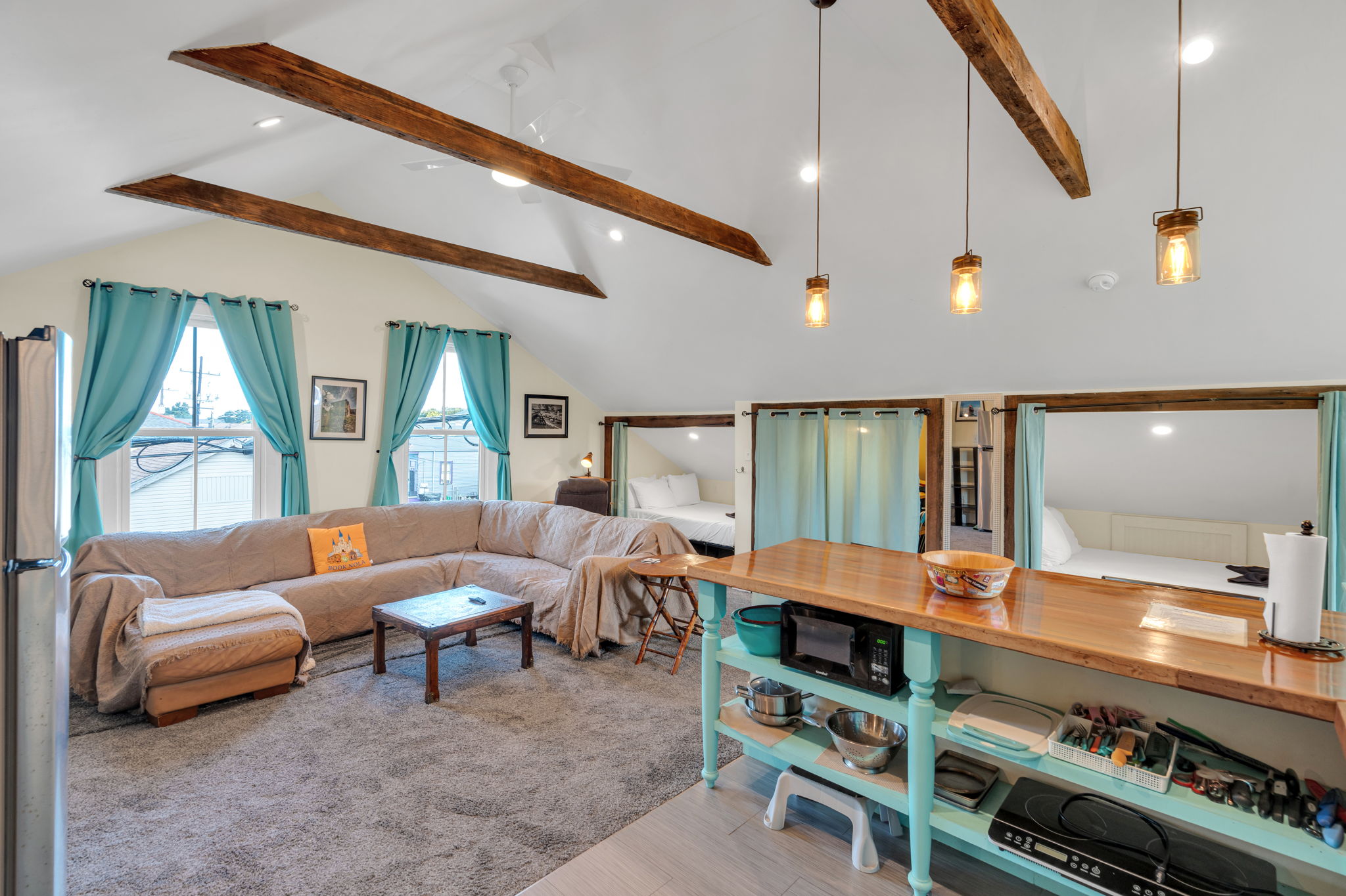 Spacious living room with vaulted ceilings and plenty of seating