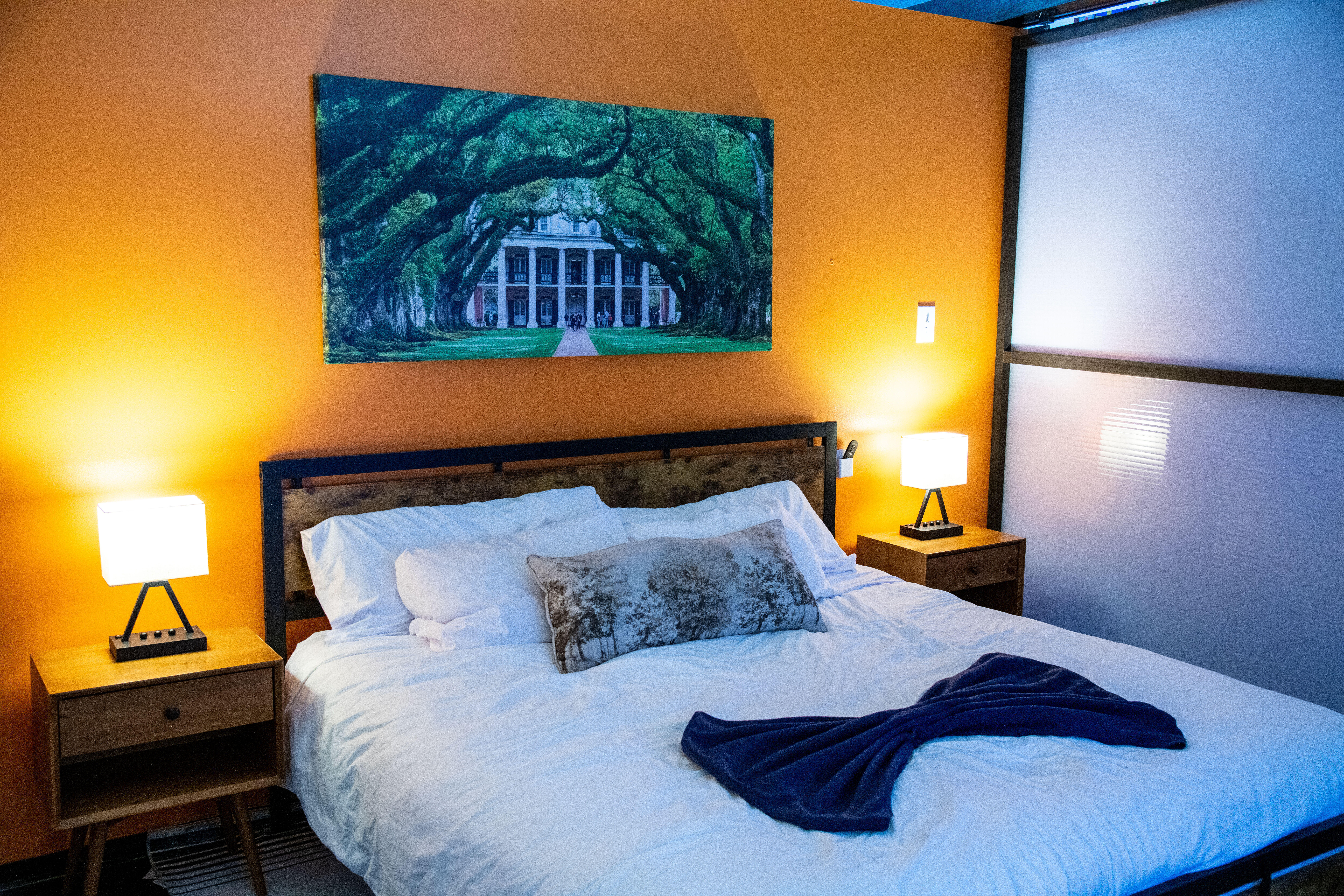 Rest easy surrounded by warm tones and New Orleans charm.