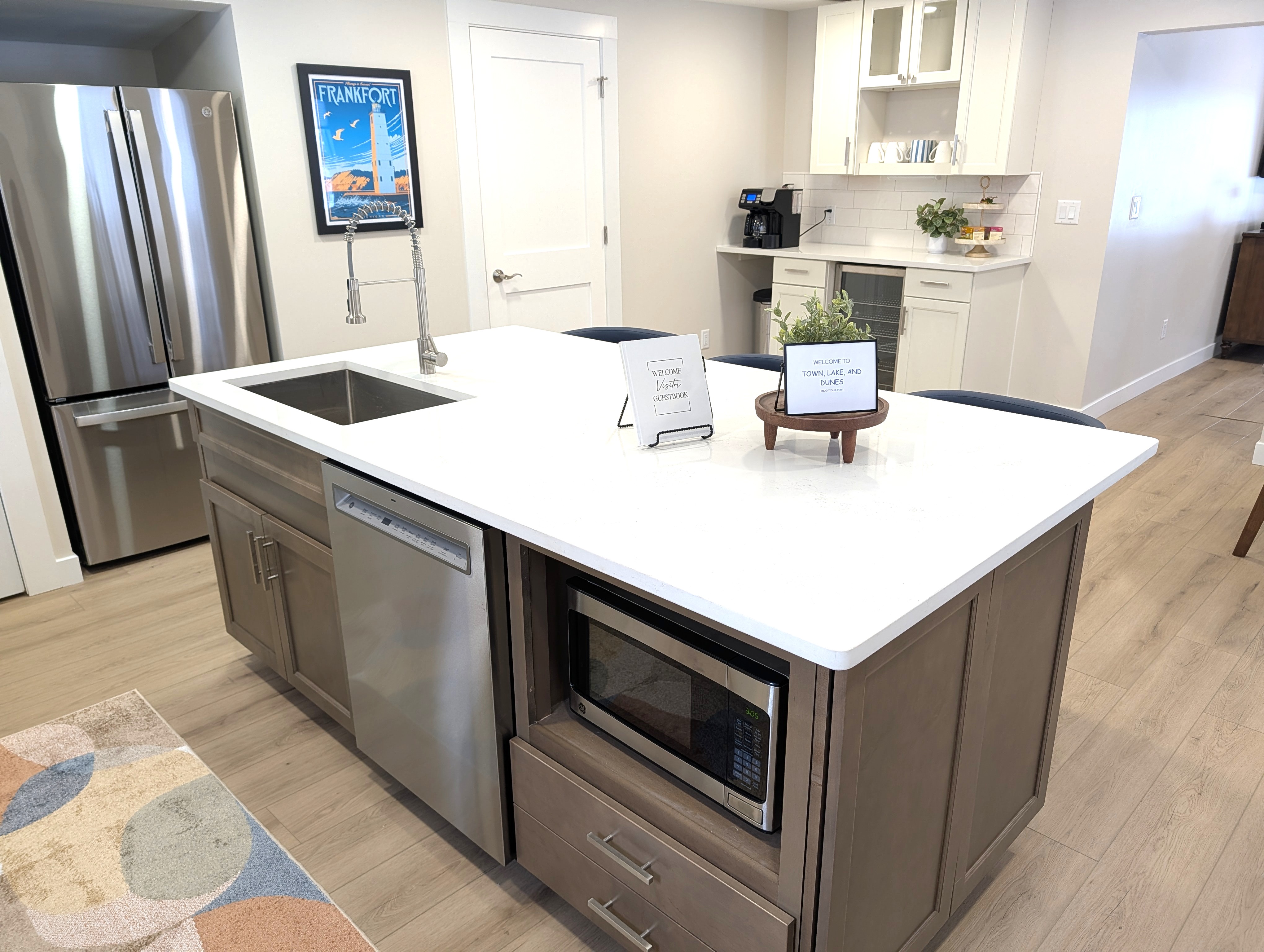 KITCHEN:  The home has a big and beautiful kitchen with all appliances including a dish washer, coffee bar, food pantry, and separate beverage cooler