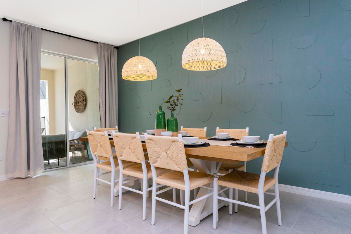 Gather around the dining table and enjoy memorable meals in this inviting space