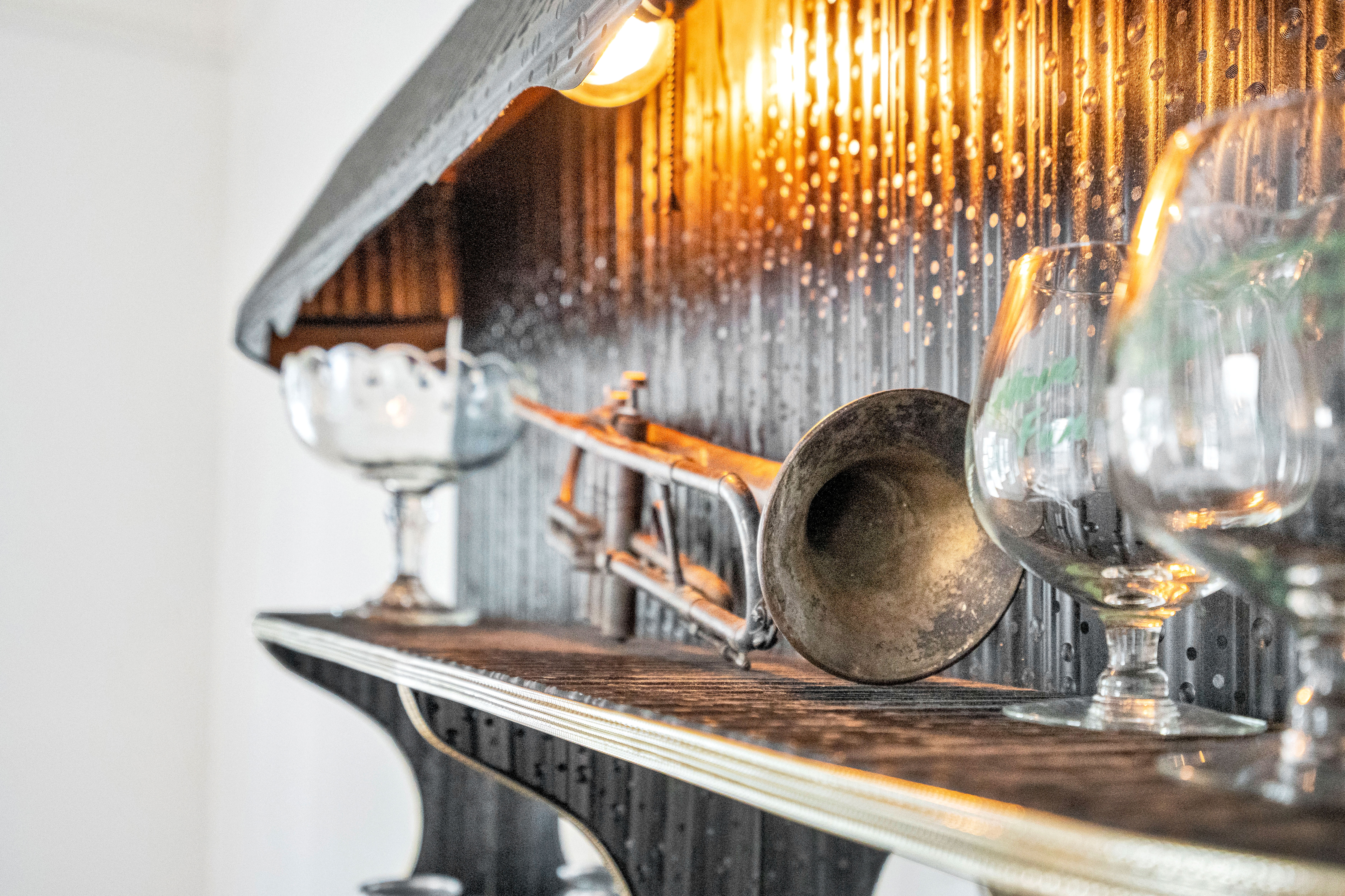 Thoughtfully styled bar shelf with décor