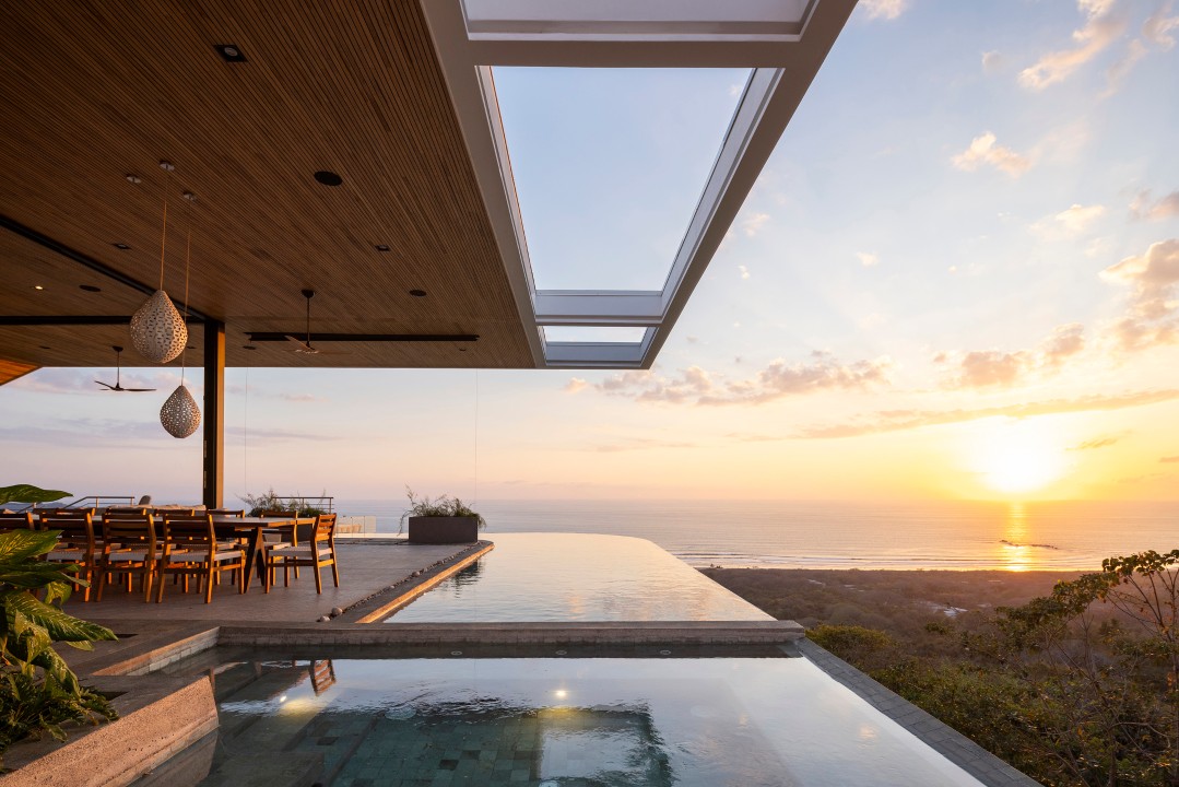 In the Villa you are greeted with a large infinity saltwater pool and ...