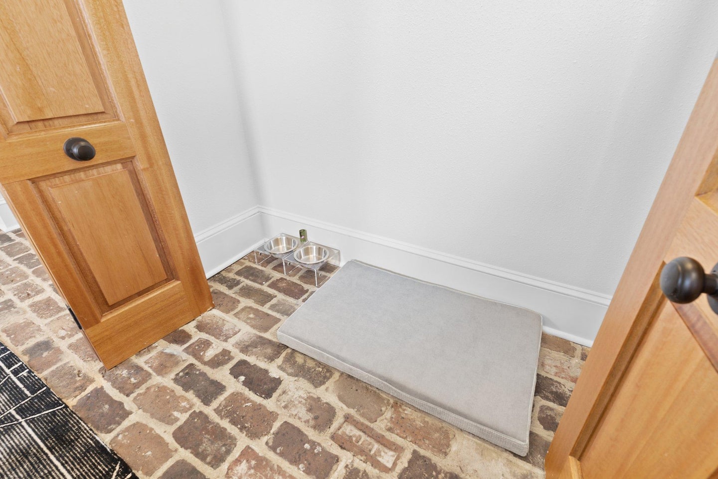 Pet bed, bowls, and poop bags for our furry visitors!