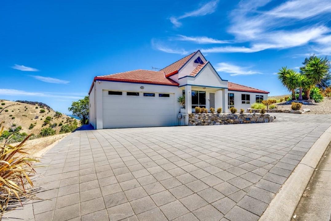 Ample On-Site Parking
Driveway accommodates multiple vehicles, convenient for group travel or guests with boats.