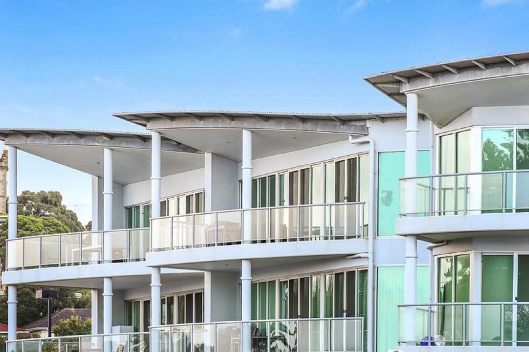 Includes secure lift to the top floor, wide walkways, sensor lighting, video-monitored entry, and swipe card gate access.