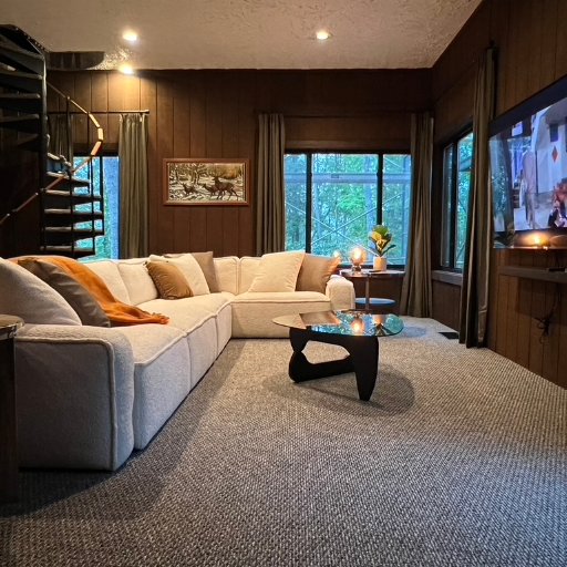 Plush sectional and fireplace perfect for cozy movie nights