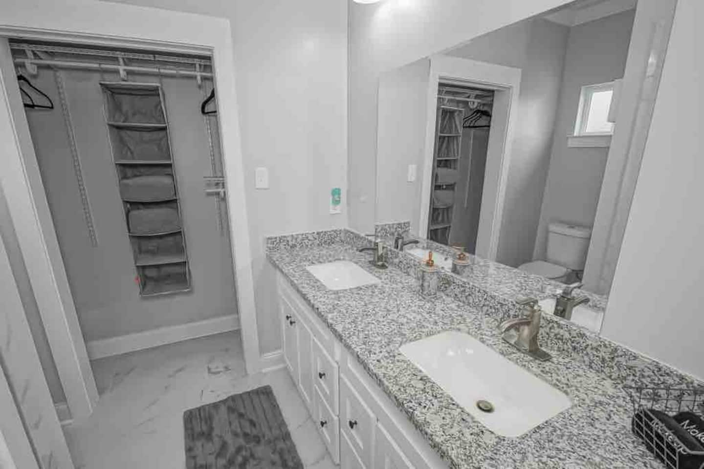 Master in-suite bathroom with makeup towels and hair dryer in top drawer