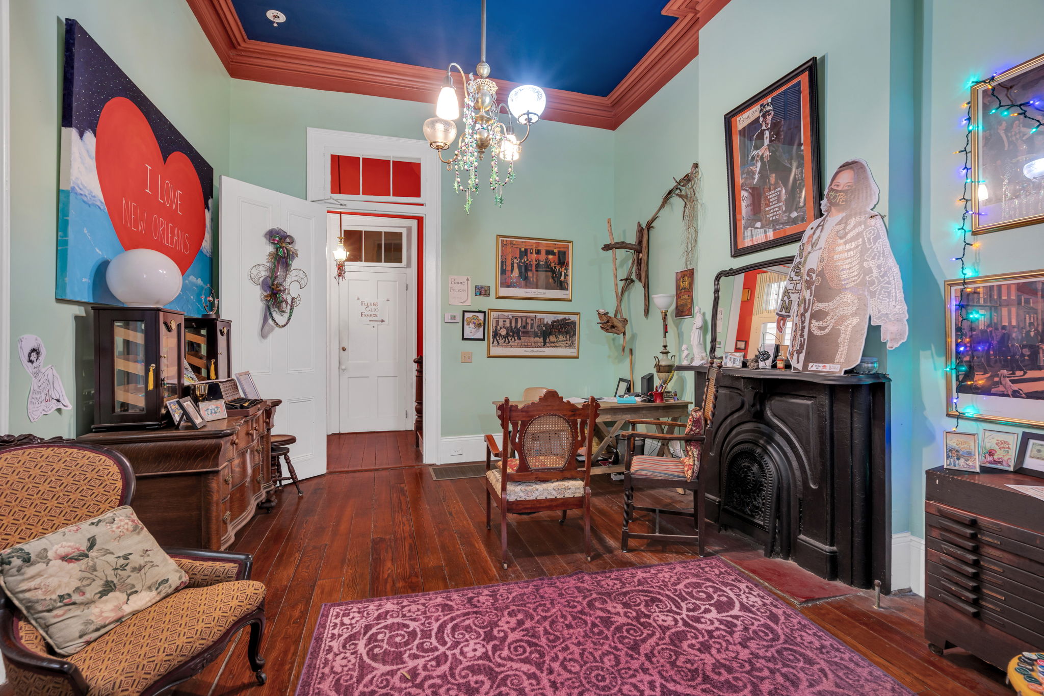 Experience NOLA charm in this vibrant, art-filled room