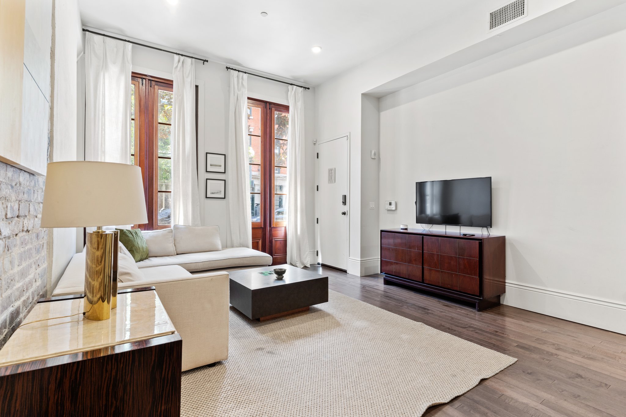 Spacious living room with sectional couch + TV