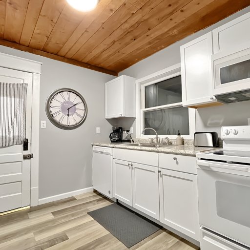 Large galley style kitchen stocked with everything you need. 