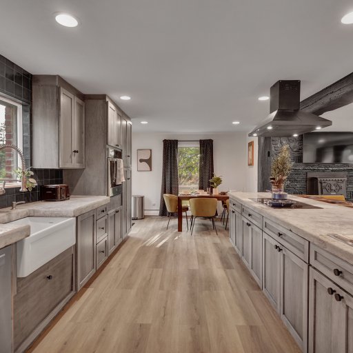Open-concept kitchen flowing seamlessly into gathering spaces.