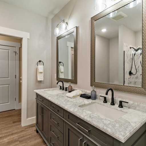 Main Bathroom – Double Vanity, Modern Fixtures & Easy Access from Bedrooms
