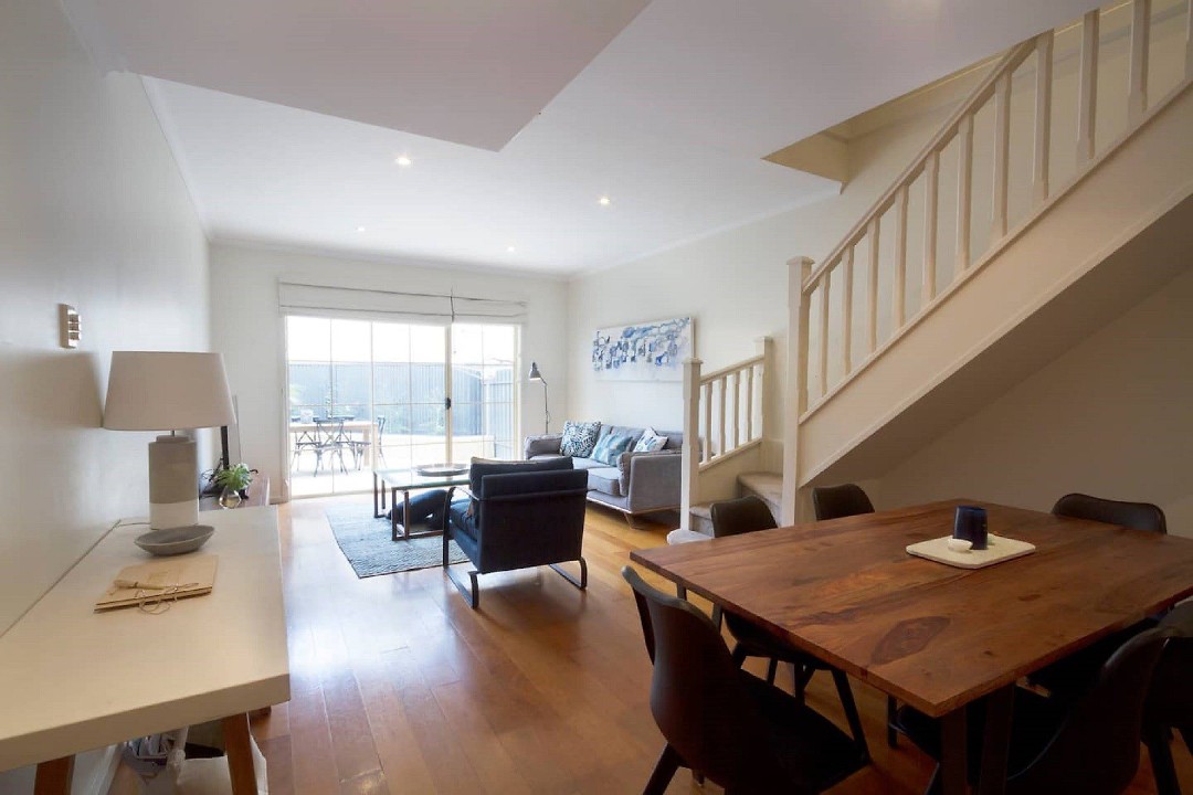 Norwood Saltbush Retreat is a 2 story 3-bedroom townhouse with modern, open-plan living downstairs, where the kitchen overlooks the dining and living areas, and out to the outdoor entertaining area.