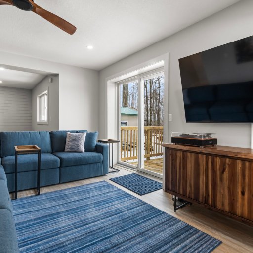 Sliding door to the deck and lake from the living room