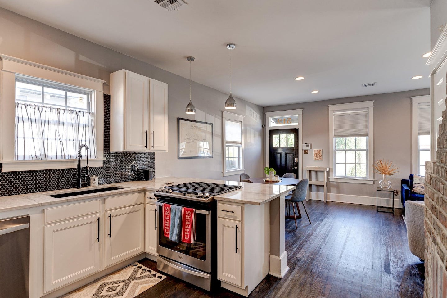 view of the kitchen and the dining room space