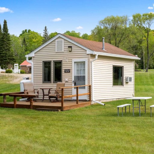 Private deck seating, perfect for morning coffee or evening sunsets overlooking the lakefront setting.