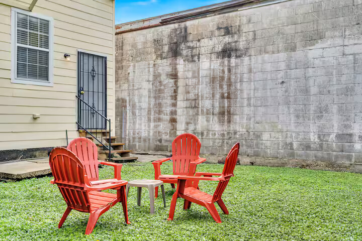 Backyard with seating arrangements.