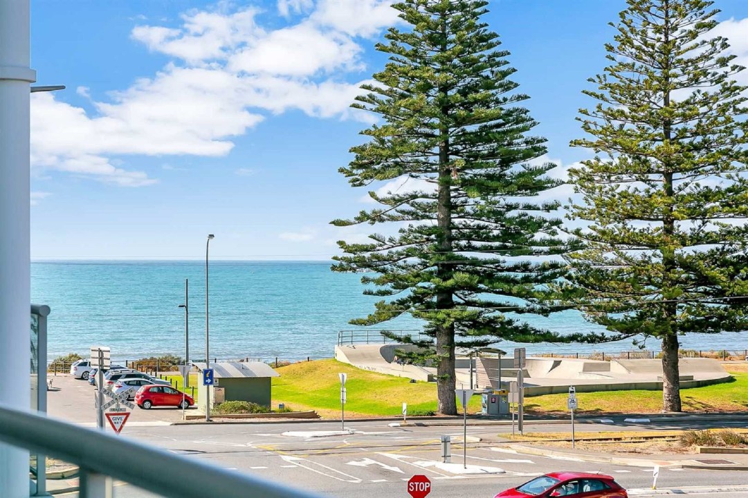 Stunning views from the balcony span Victor Harbor, Granite Island, and the surrounding hills