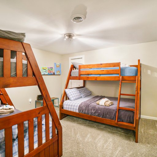 Cozy bunk room with twin-over-full beds — ideal for kids or group stays.