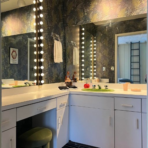 Spacious bathroom vanity with modern fixtures and storage