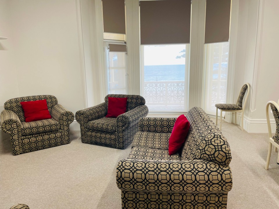 Open plan lounge, dining, and kitchen areas with smart TV, free WiFi, split system air conditioning, modern kitchens, and refurbished bathrooms in each unit featuring contemporary fixtures for guest comfort.