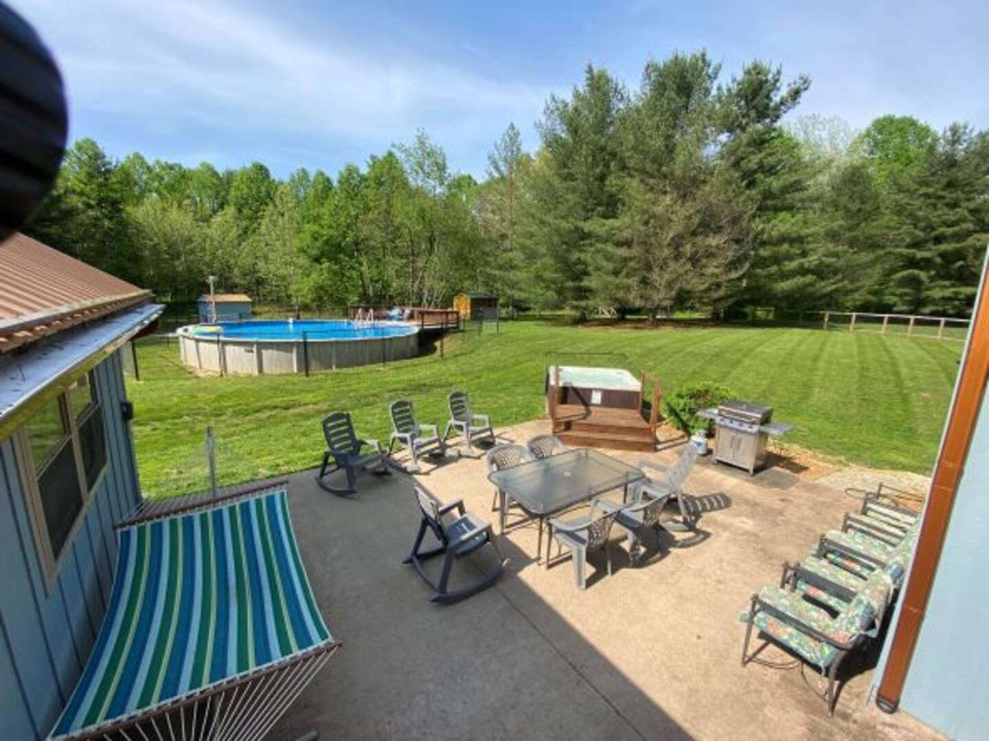 Patio with 33-foot pool and hot tub