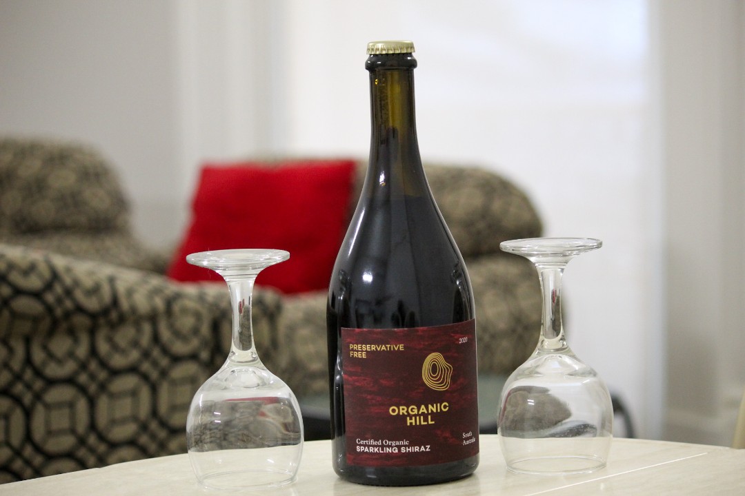 A full-sized dining table provides the perfect setting for shared meals, celebrations, or planning the next day’s adventures. (Wine pictured is for styling purposes only.)