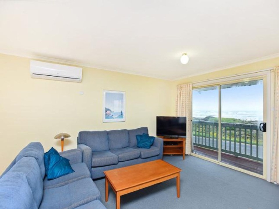 Relaxed Open-Plan Living. Comfortable and breezy with plenty of natural light. Flat-Screen TV + DVD for Nights In. You can literally hear the waves from the lounge.