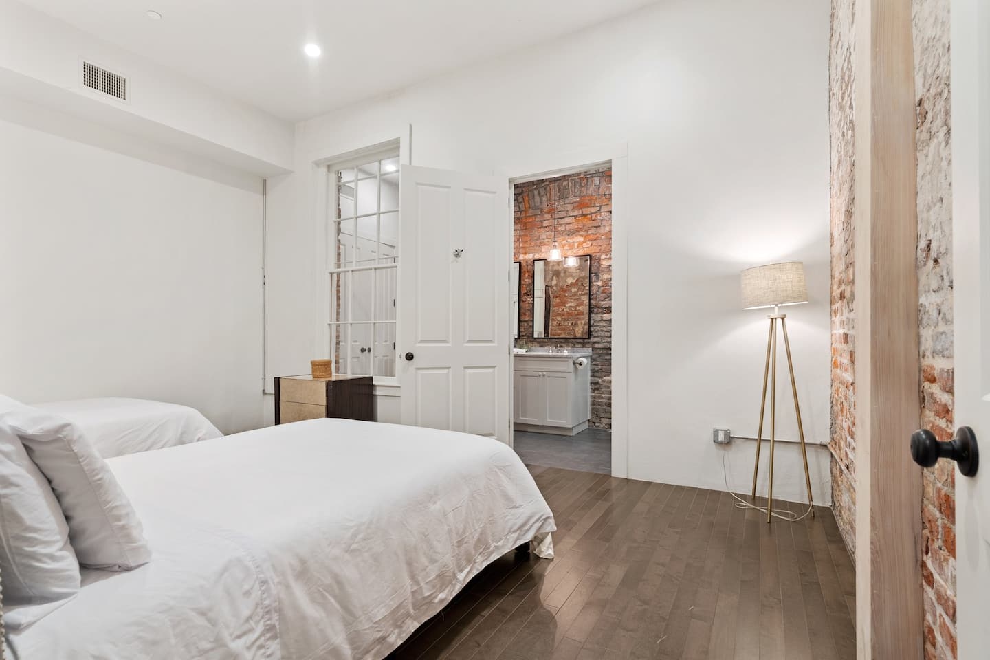 Bedroom 2 with two full sized beds and ensuite bathroom