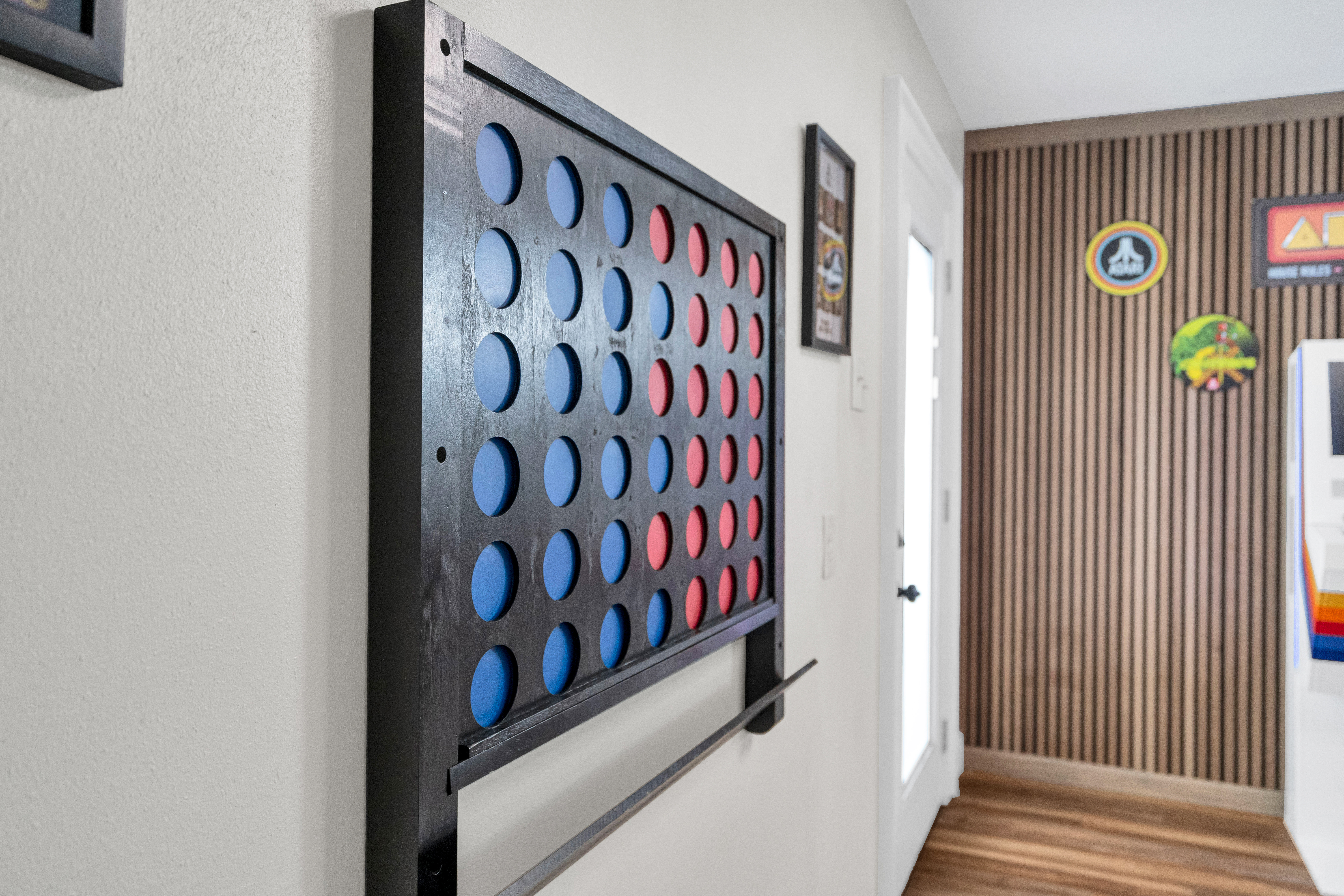 Oversized wall Connect Four game for endless fun.