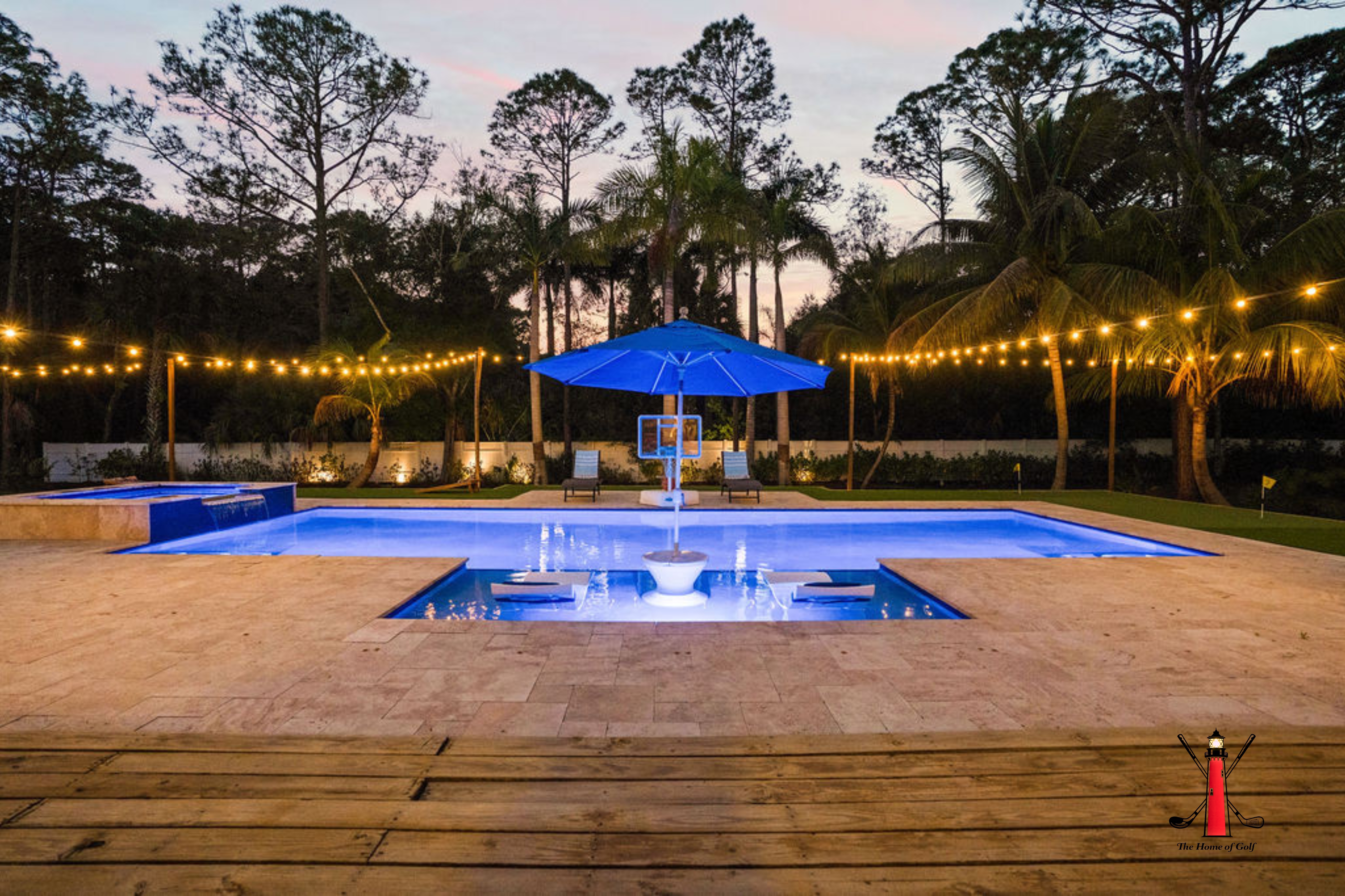 Perfect for sunny days under the blue umbrella, enjoy a refreshing dip surrounded by palm trees and serene vibes.