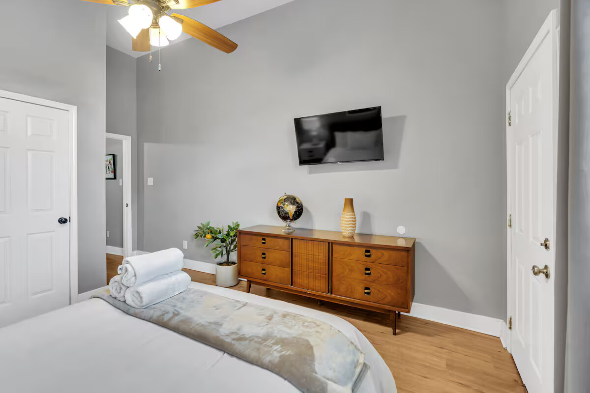 The living room is spacious and inviting, with cozy seating and plenty of natural light. It’s the perfect spot to relax, stream your favorite shows, or gather for good conversation.