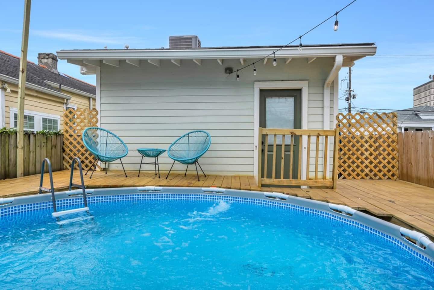 Above ground pool in backyard