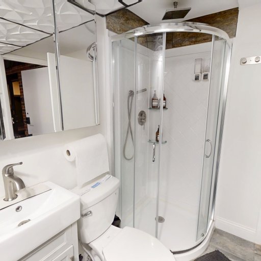 Updated full bathroom with modern finishes.