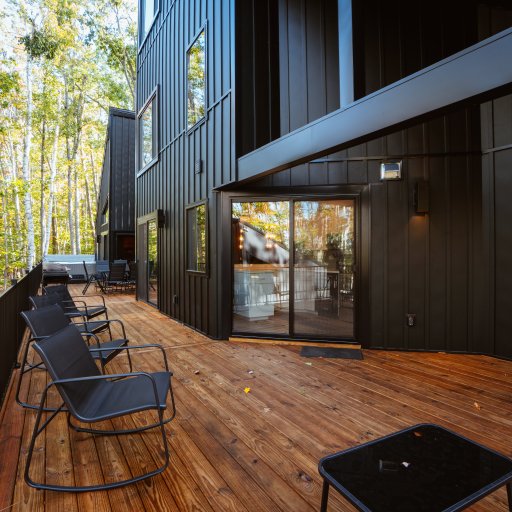 Spacious covered deck with comfortable outdoor seating